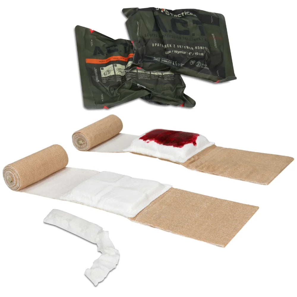 JB Tacticals ACT Bandage™ 10 cm Aktīvās Kompresijas Pārsējs ar Brūces Tamponādes Moduli